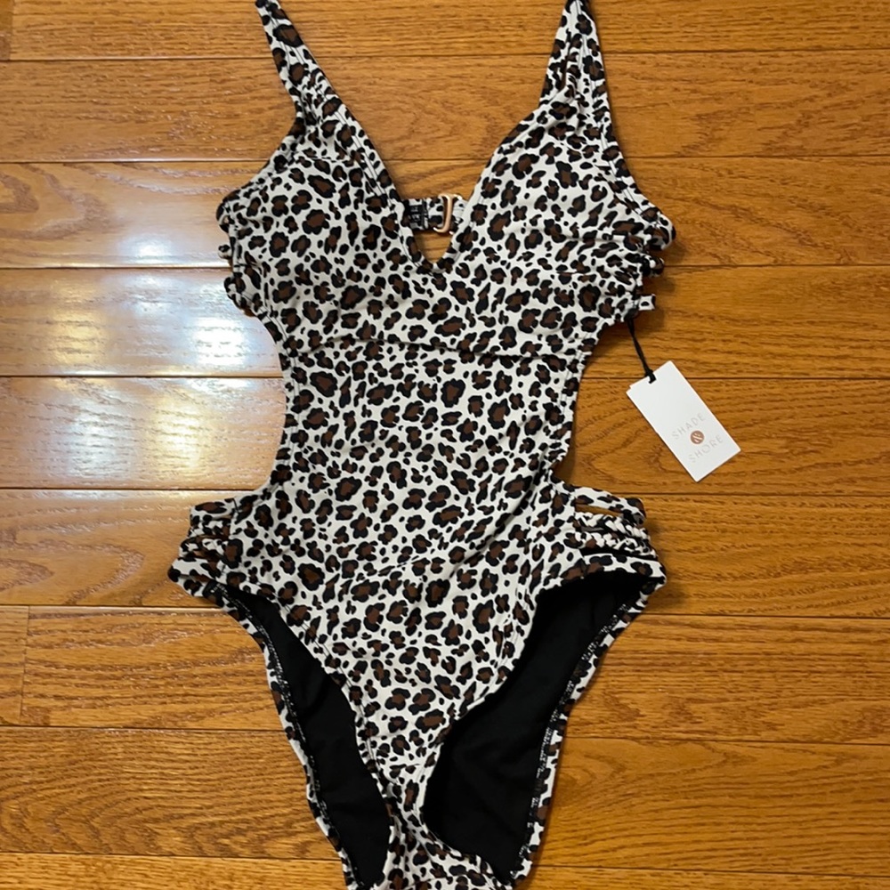 One piece cut out cheetah print bathing suit.